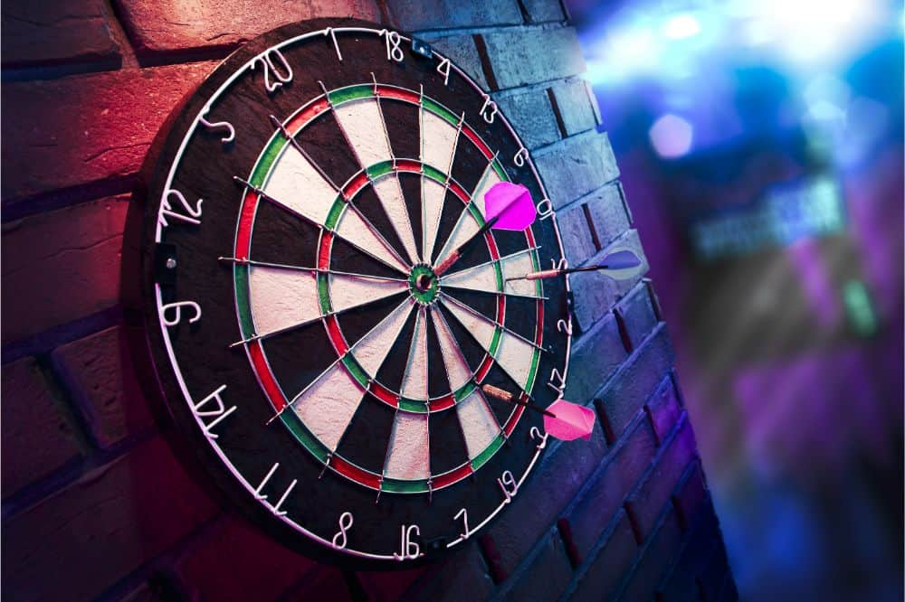Dart board on a brick wall